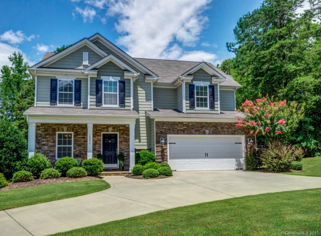 16854 Rudence Court Charlotte, NC 28278 - Photo 1 of 23 a front view of a house with a yard and garage