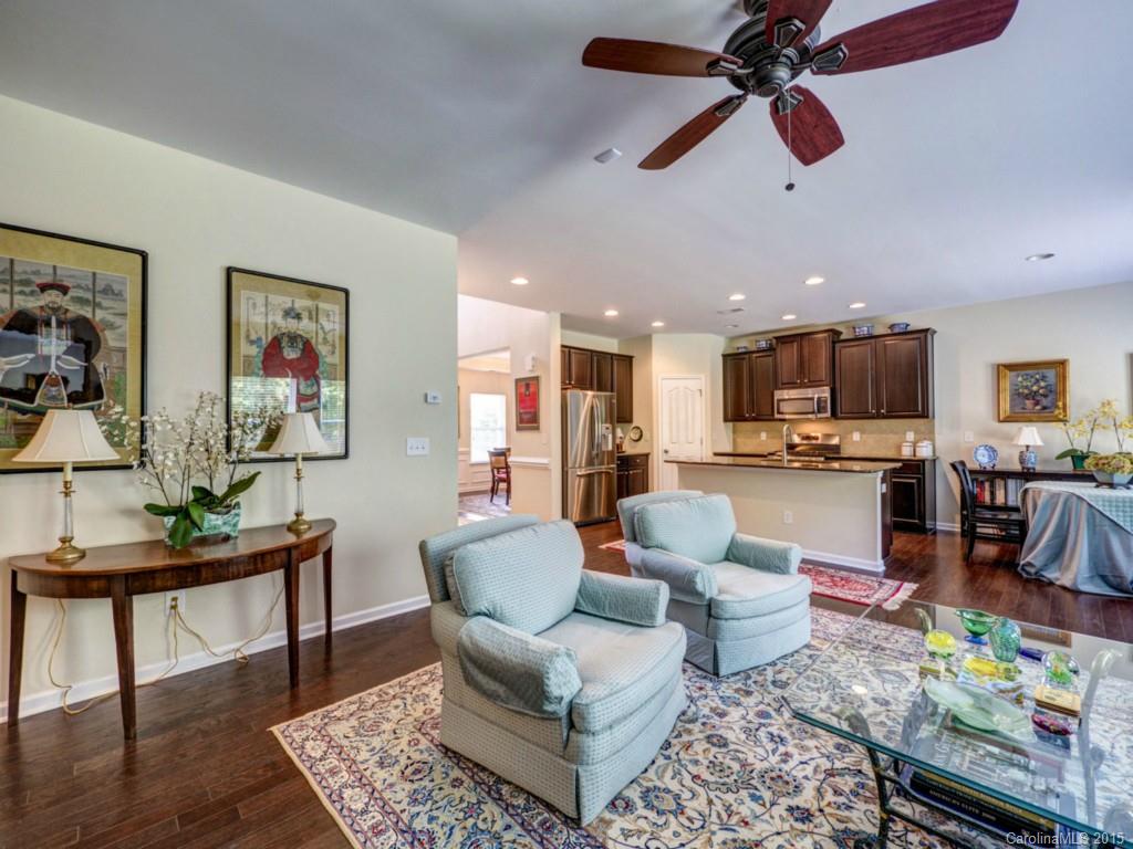 16854 Rudence Court Charlotte, NC 28278 - Photo 5 of 23 a living room with furniture kitchen view and a table