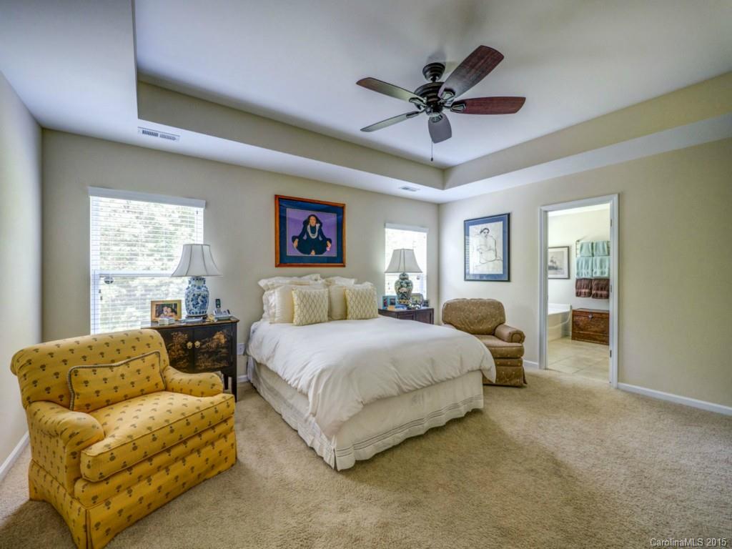 16854 Rudence Court Charlotte, NC 28278 - Photo 9 of 23 a spacious bedroom with a bed and window