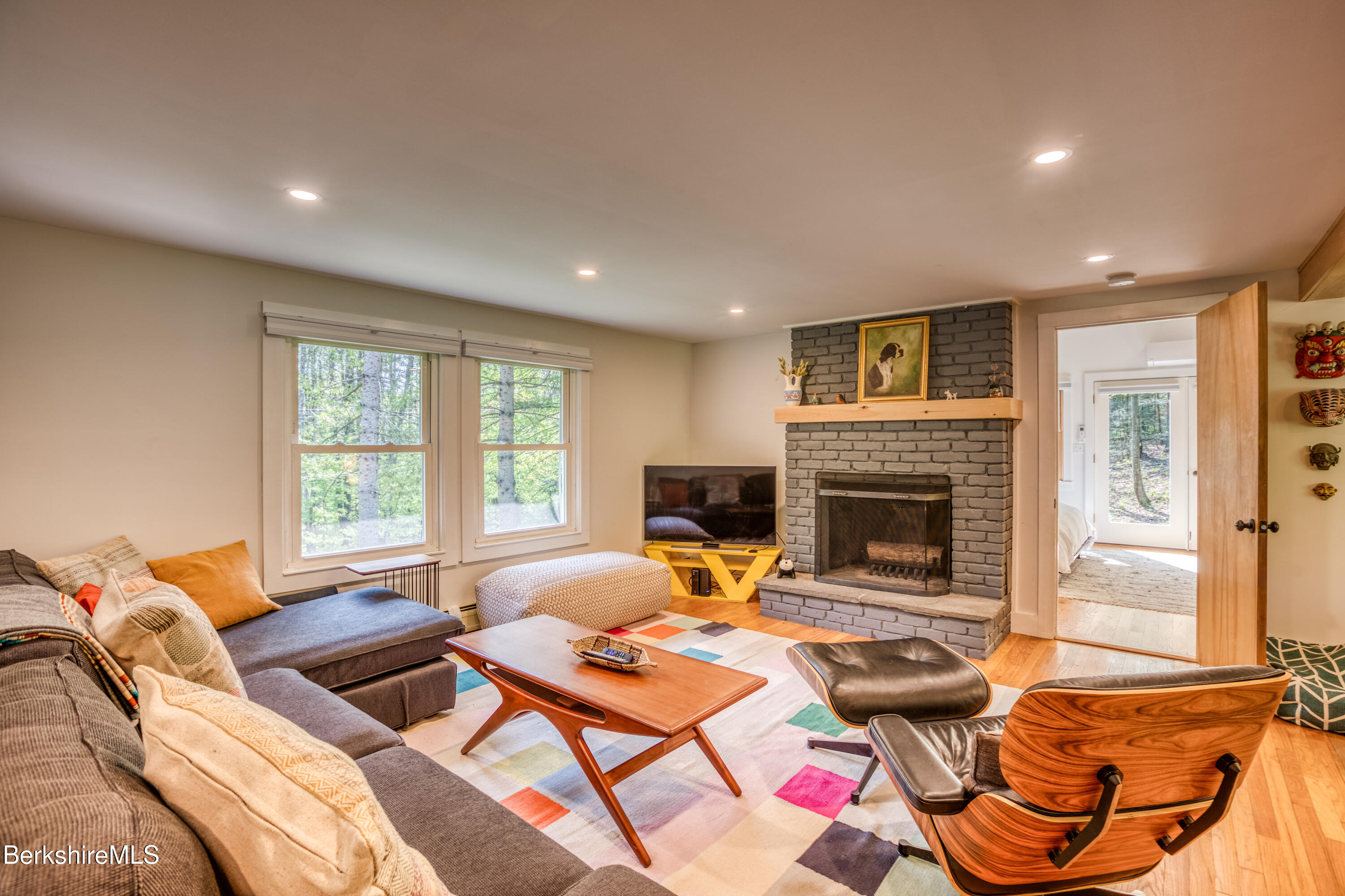 6 Lake Buel Road Great Barrington, MA 01230 - Photo 19 of 38 a living room with furniture and a fireplace