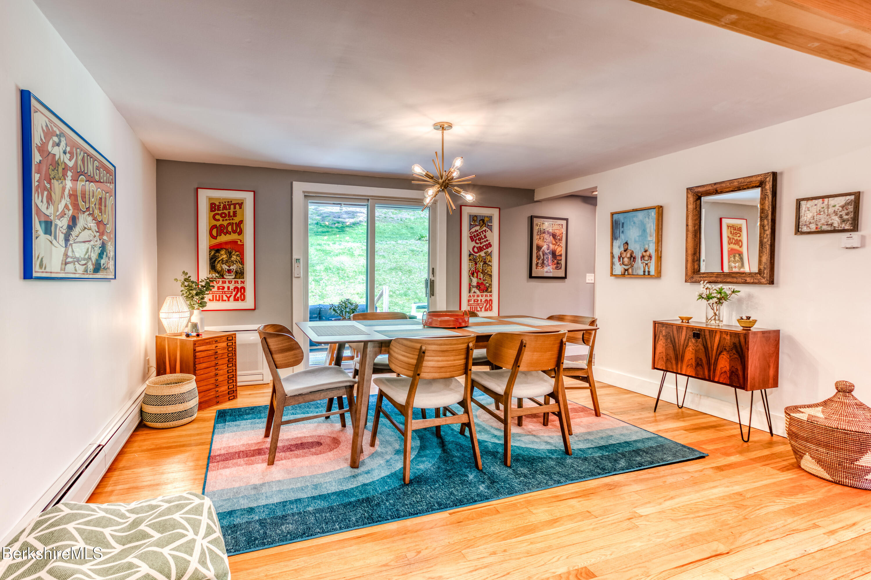 6 Lake Buel Road Great Barrington, MA 01230 - Photo 22 of 38 a living room with furniture a dining table and next to a window