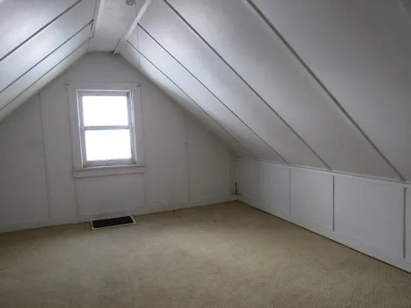 a view of a room that has window