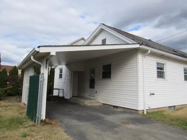 a view of a house with a garage