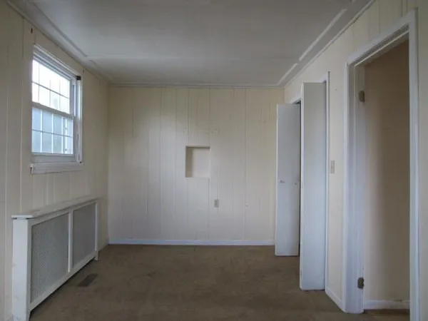 an empty room with windows