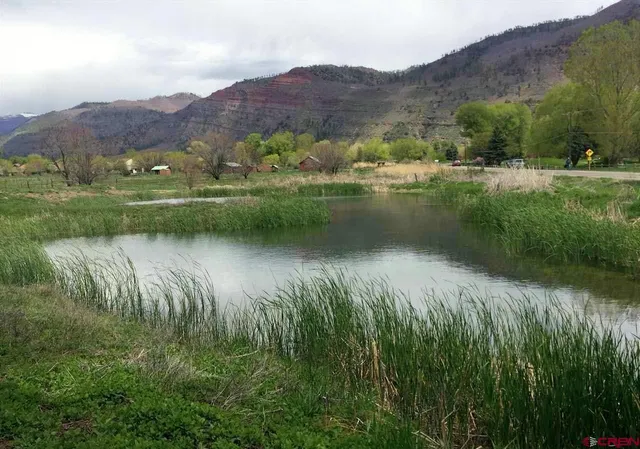 a view of lake with mountain