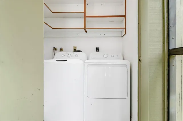 a utility room with dryer and washer