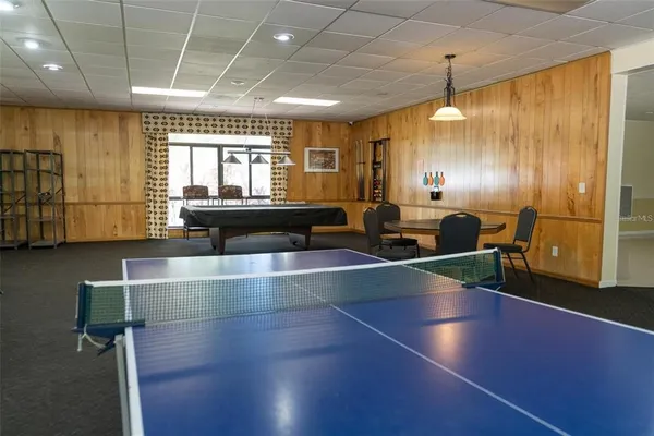 a large room with lots of counter space and windows