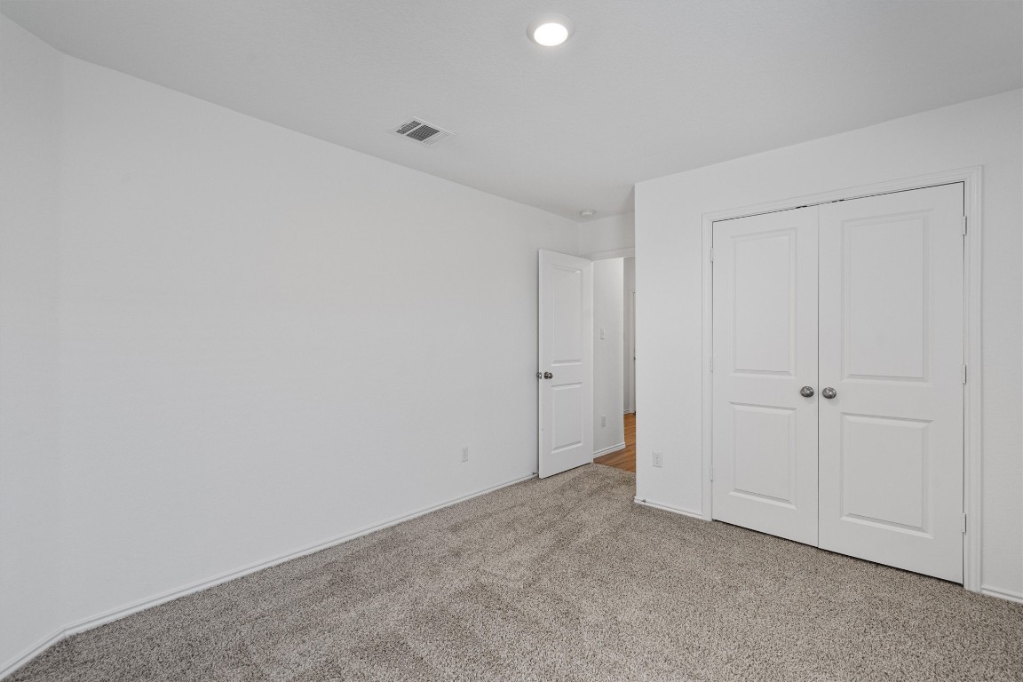 3213 Ancira Place Pflugerville, TX 78660 - Photo 22 of 30 a view of an empty room
