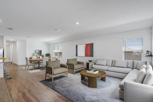 a living room with furniture and a couch