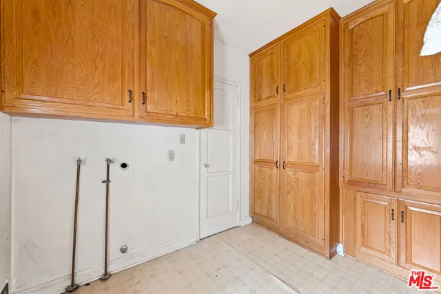 a view of wooden door and entryway