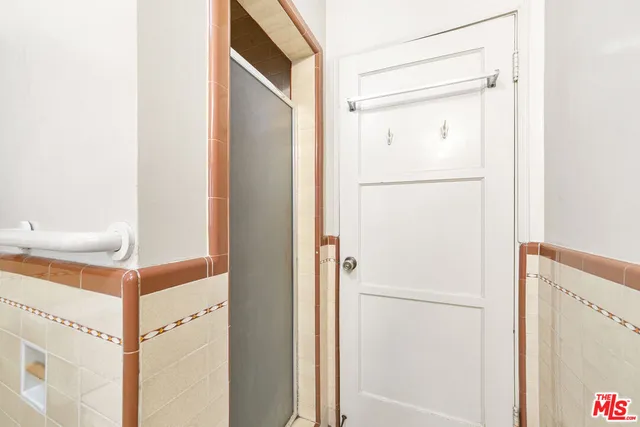 a white refrigerator freezer and a dishwasher