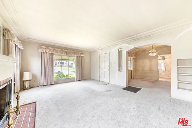 a view of livingroom with furniture and window