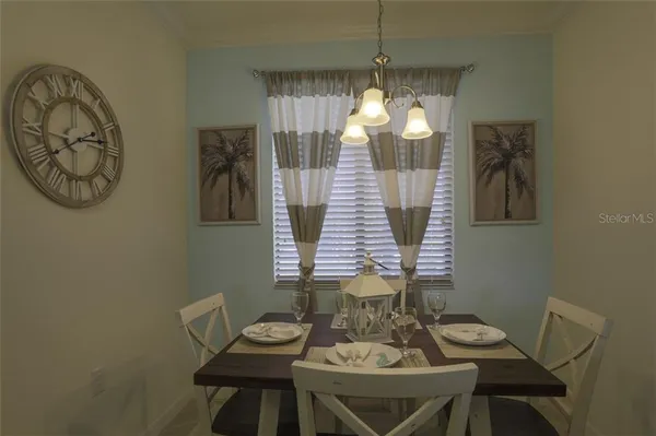 a view of a dining room with furniture