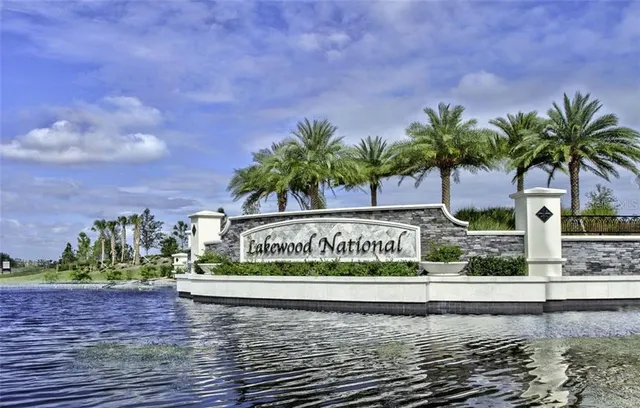 a view of a street with a building in the background