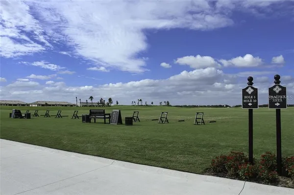 a view of a golf course with a garden