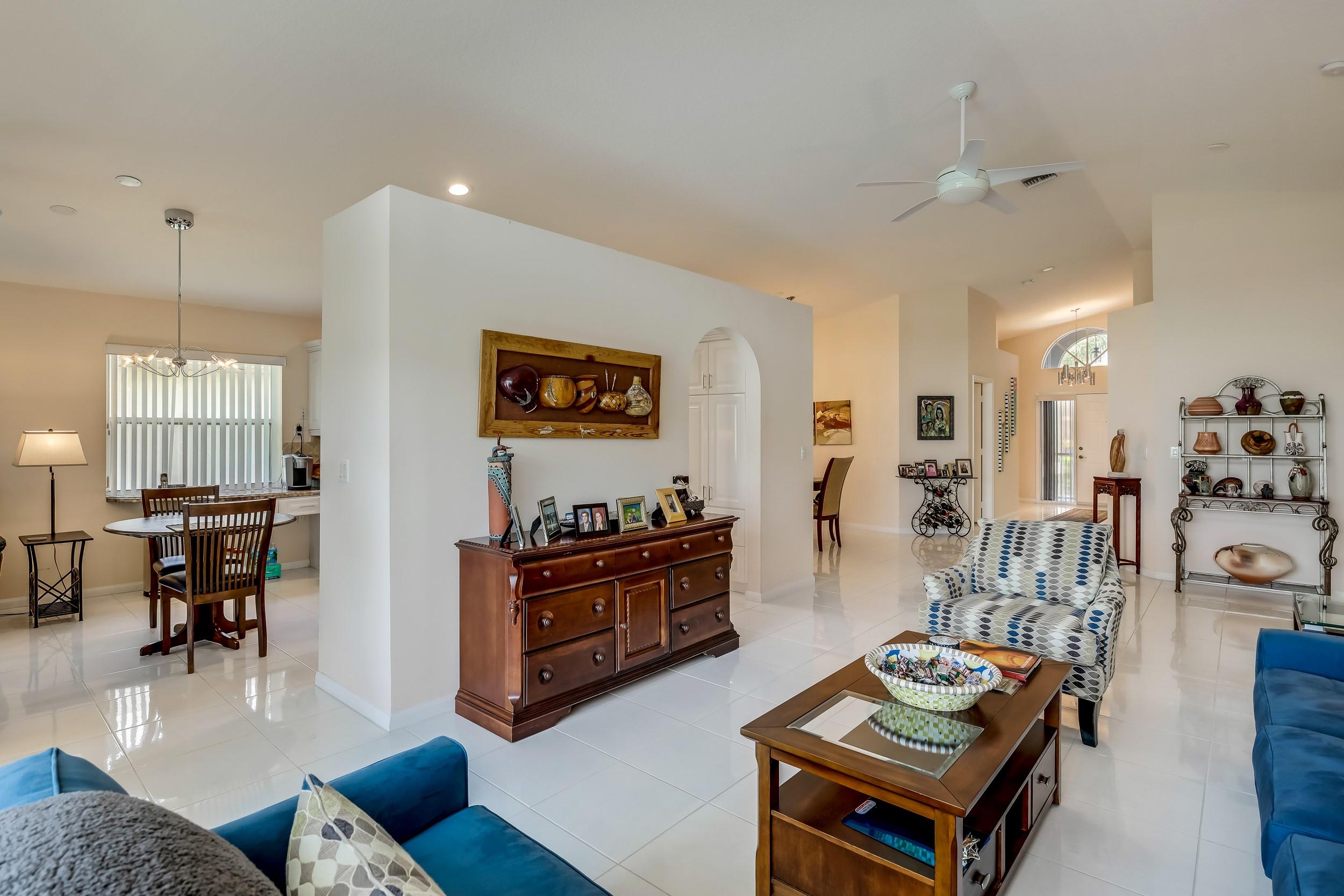 6741 Sun River Road Boynton Beach, FL 33437 - Photo 12 of 57 Living Room looking into kitchen