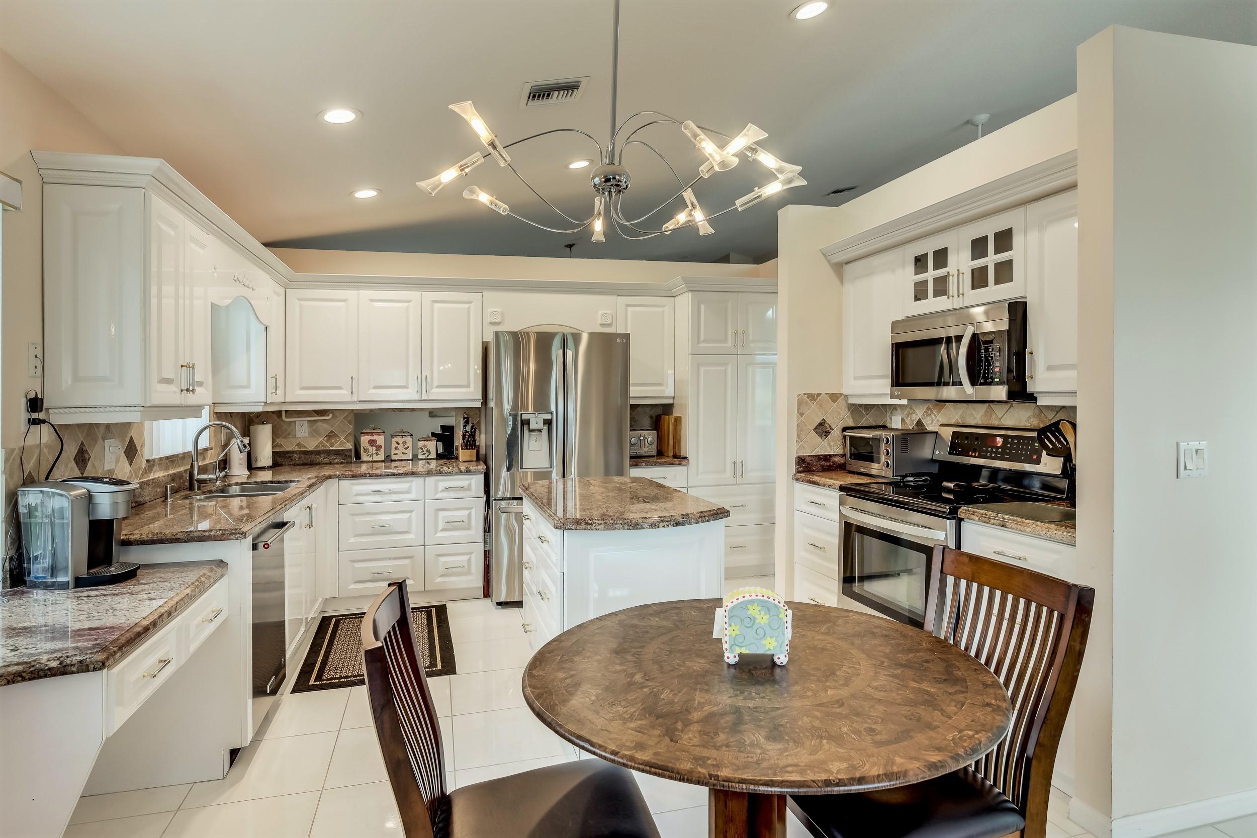 6741 Sun River Road Boynton Beach, FL 33437 - Photo 13 of 57 Breakfast area/Kitchen