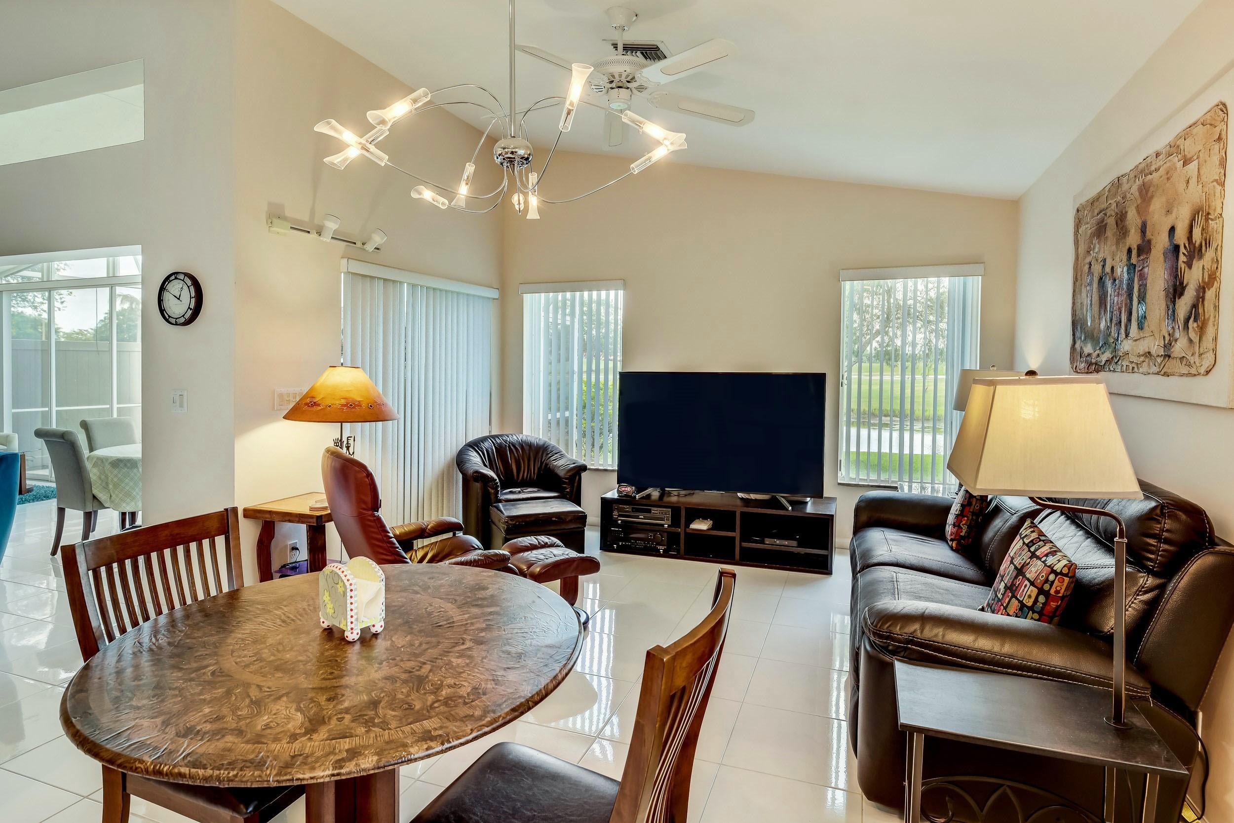 6741 Sun River Road Boynton Beach, FL 33437 - Photo 17 of 57 Breakfast Area & Family Room