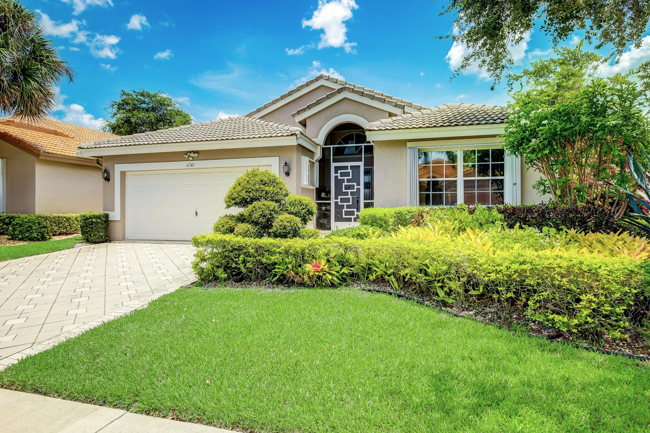6741 Sun River Road Boynton Beach, FL 33437 - Photo 2 of 57 Lots of Curb Appeal