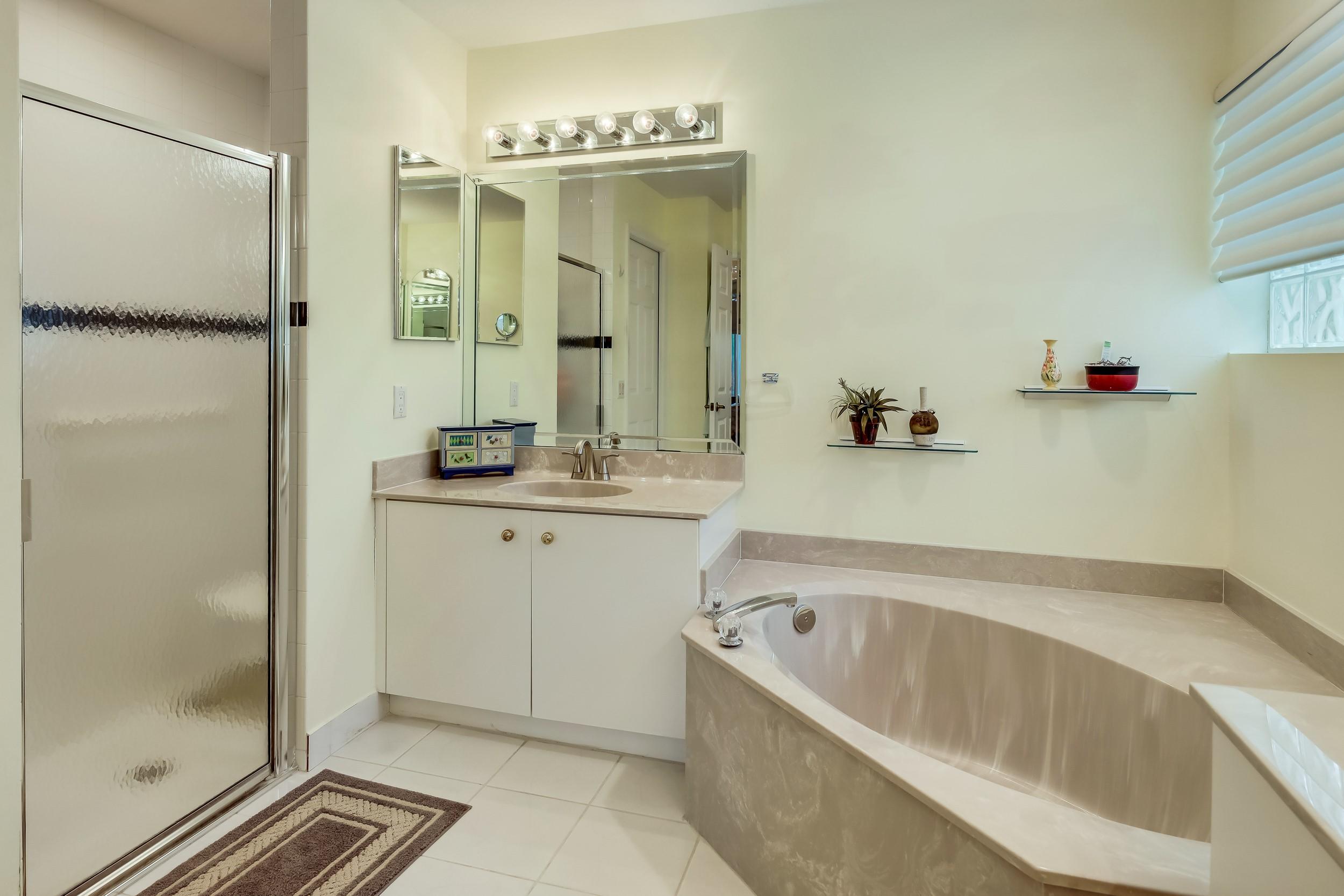 6741 Sun River Road Boynton Beach, FL 33437 - Photo 26 of 57 Soaking tub & shower w/grab bars