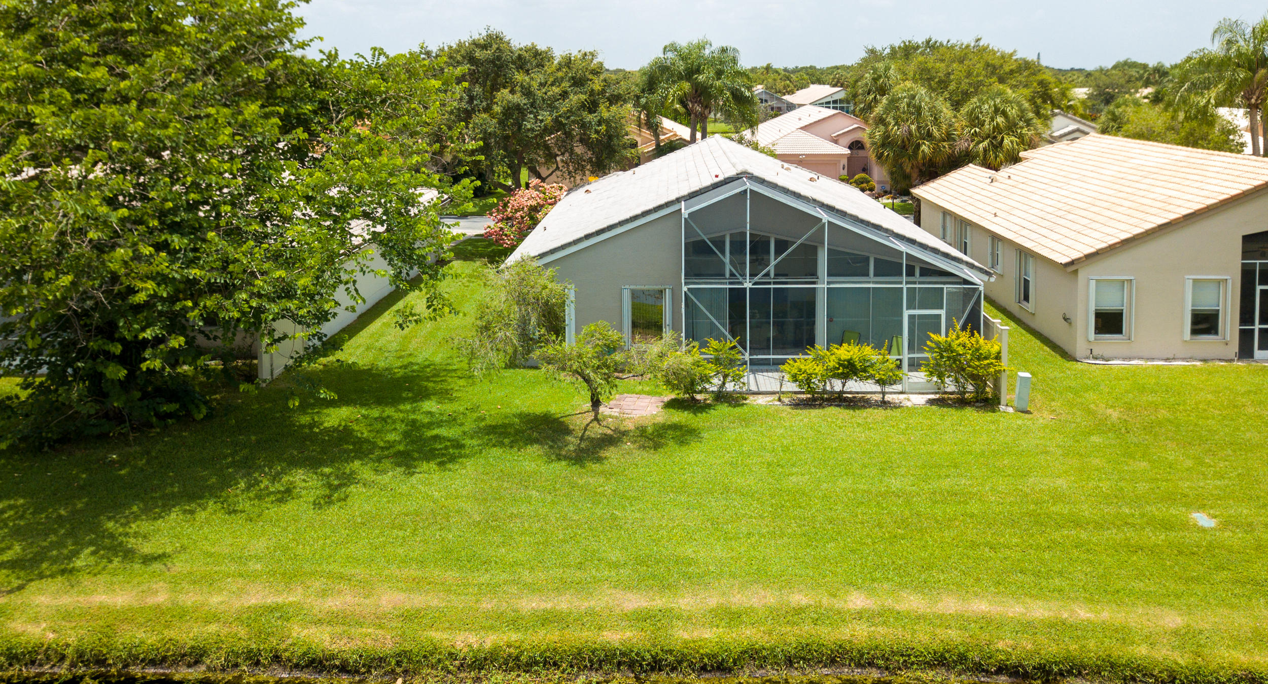 6741 Sun River Road Boynton Beach, FL 33437 - Photo 38 of 57 Aerial of back of home