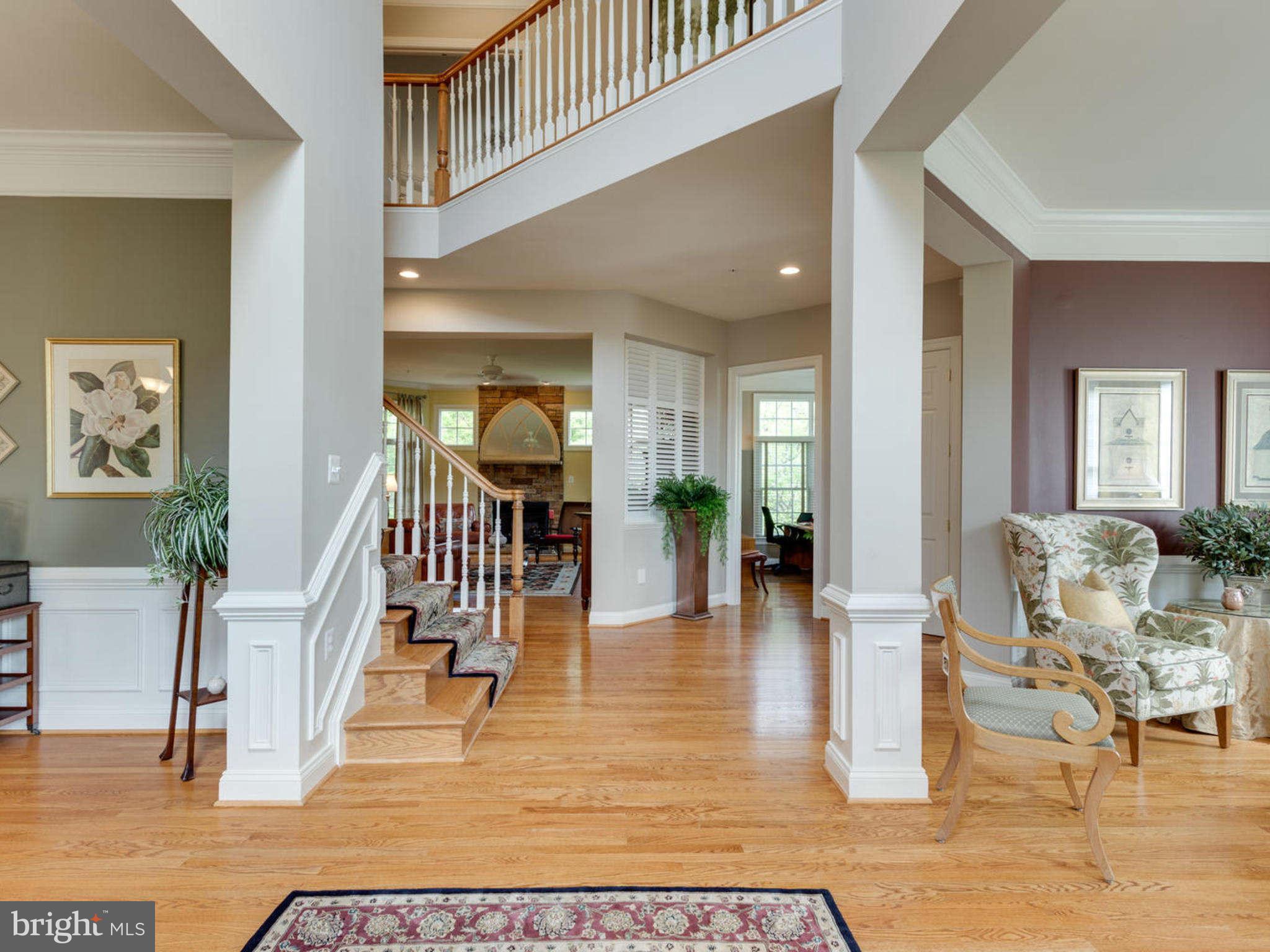 9208 Jones Mill Road Chevy Chase, MD 20815 - Photo 2 of 30 a living room with furniture and a dining table