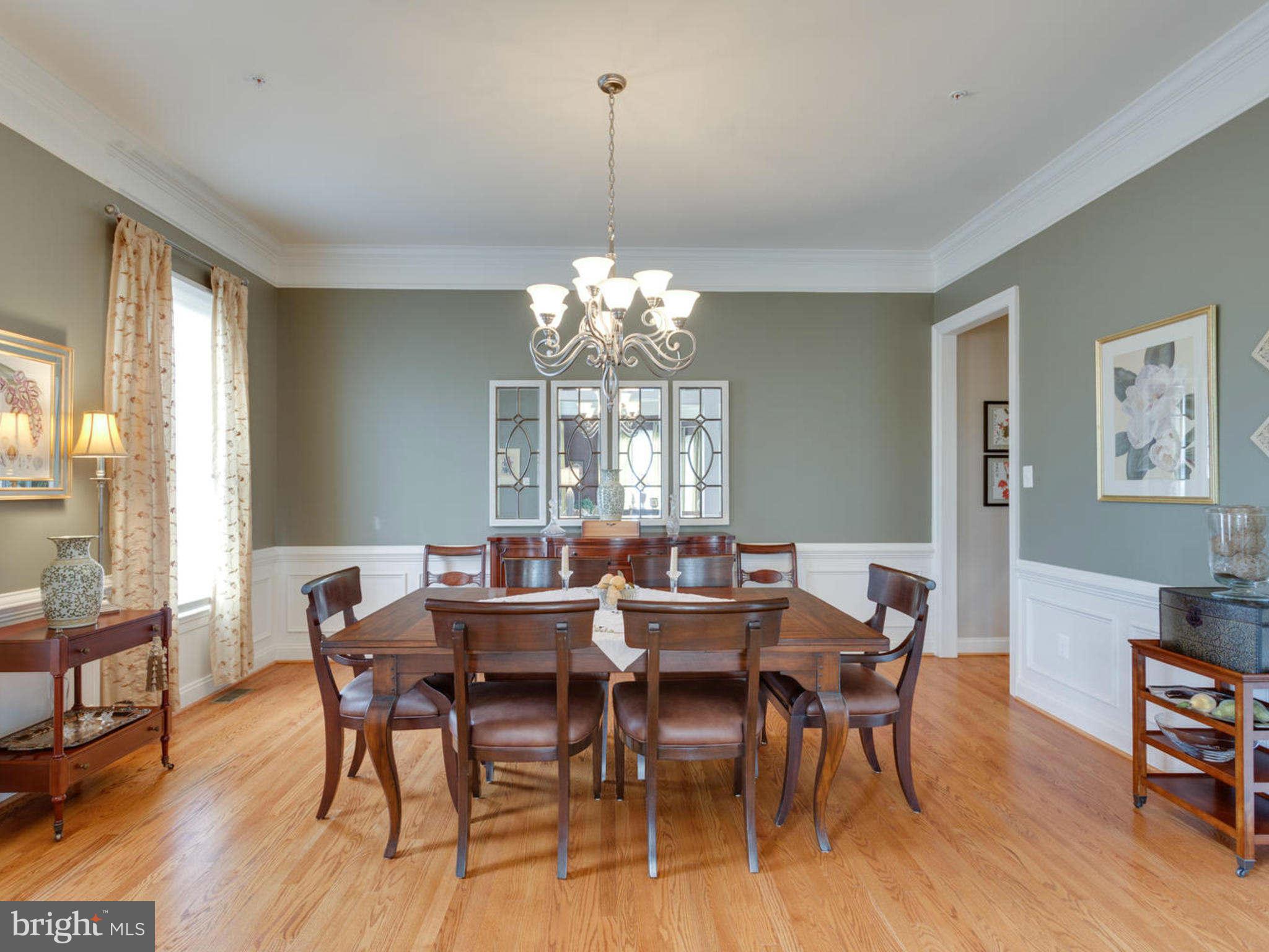 9208 Jones Mill Road Chevy Chase, MD 20815 - Photo 4 of 30 a view of a dining room with furniture window and wooden floor
