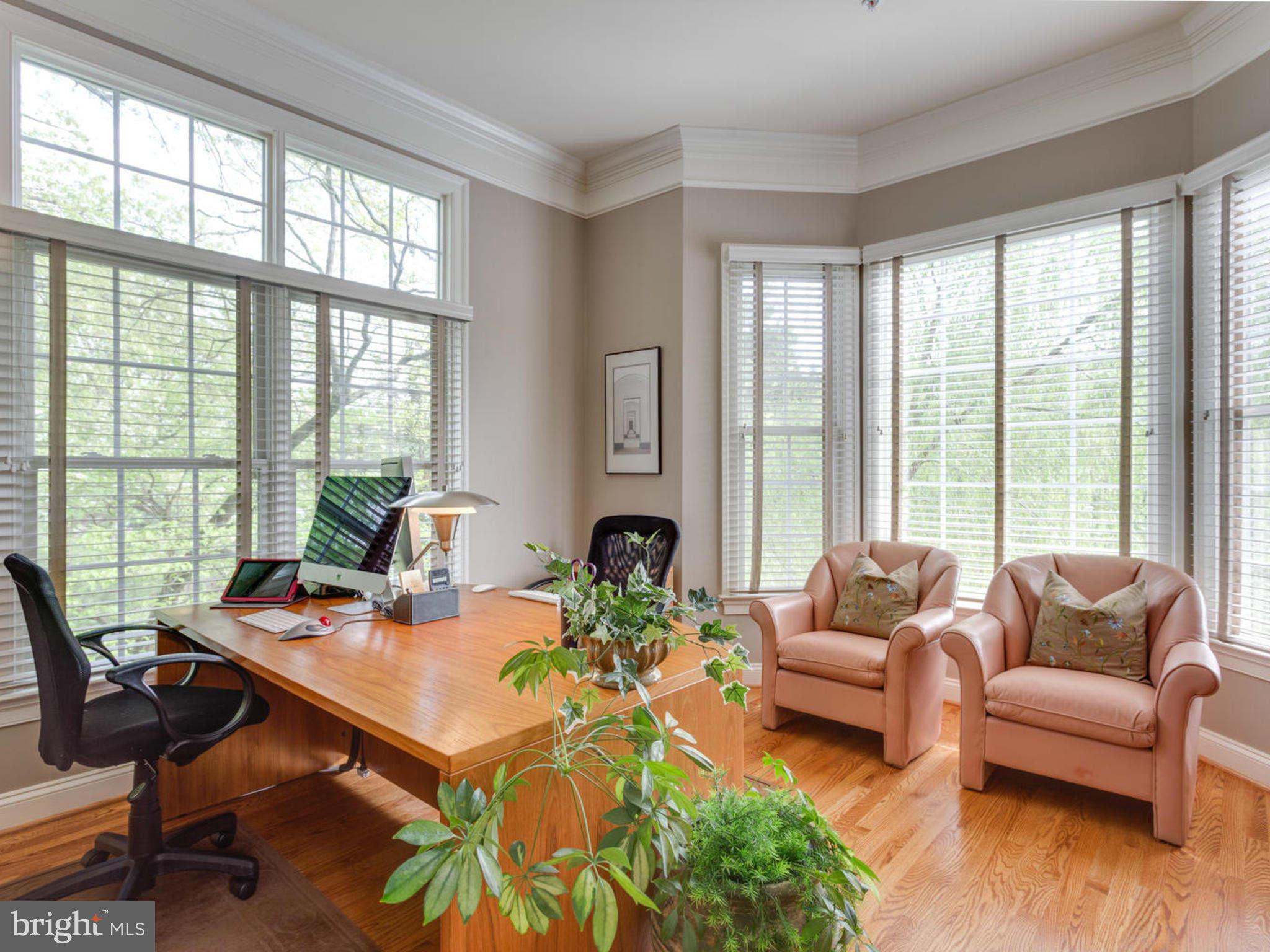 9208 Jones Mill Road Chevy Chase, MD 20815 - Photo 7 of 30 a workspace with furniture and a large window