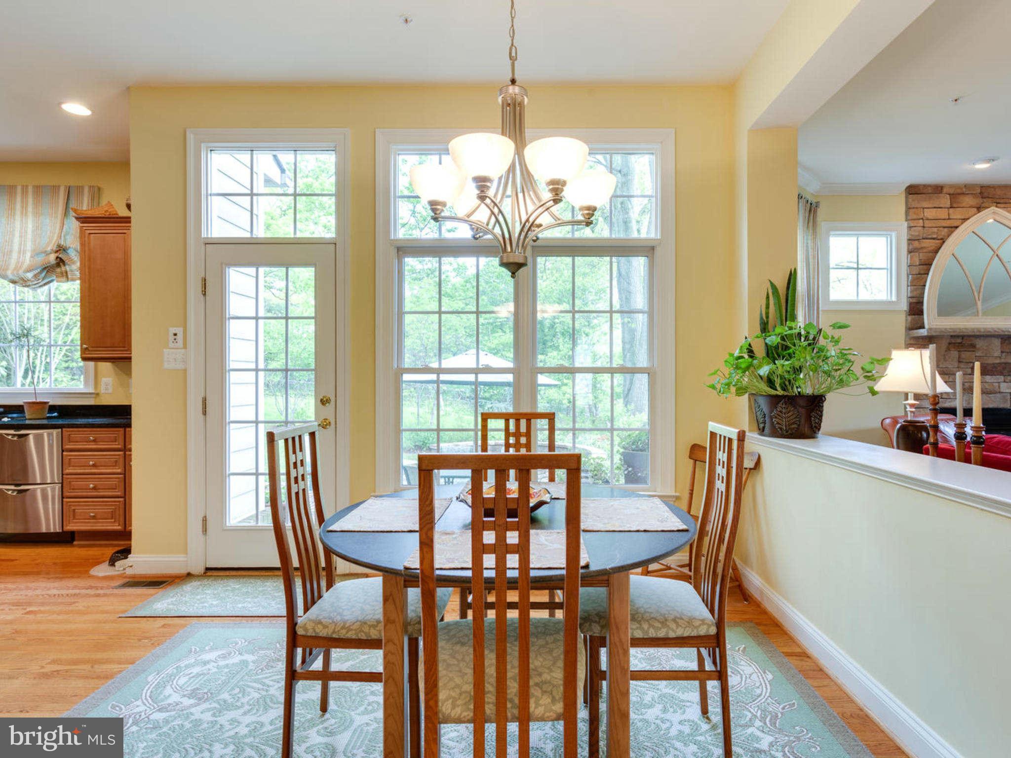 9208 Jones Mill Road Chevy Chase, MD 20815 - Photo 9 of 30 a view of a dining room with furniture window and outside view