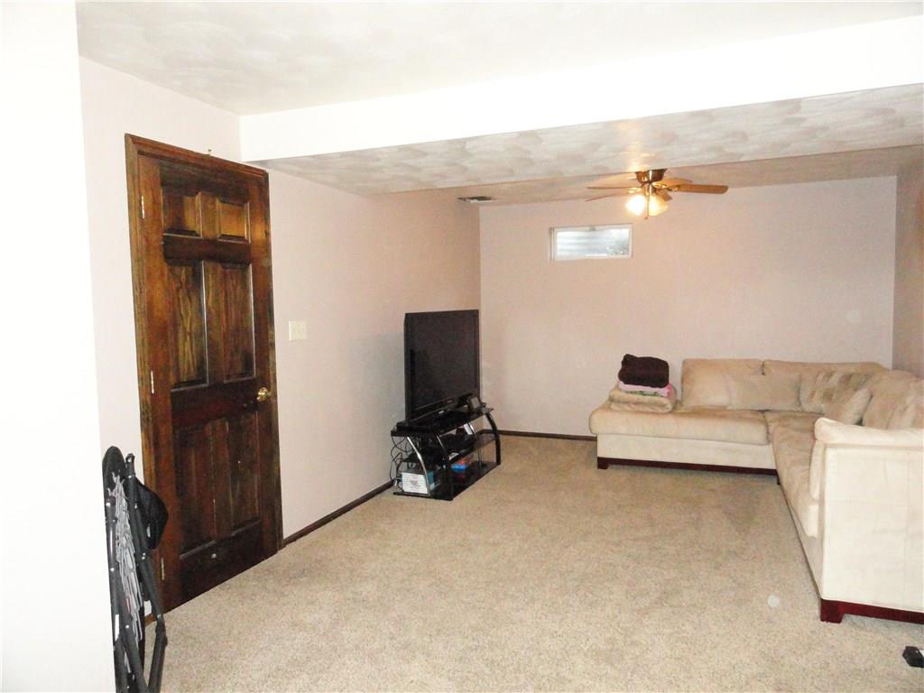 1127 Pine Run Road Apollo, PA 15613 - Photo 20 of 25 Lower level family room 11 x 24. Solid 6 panel doors throughout