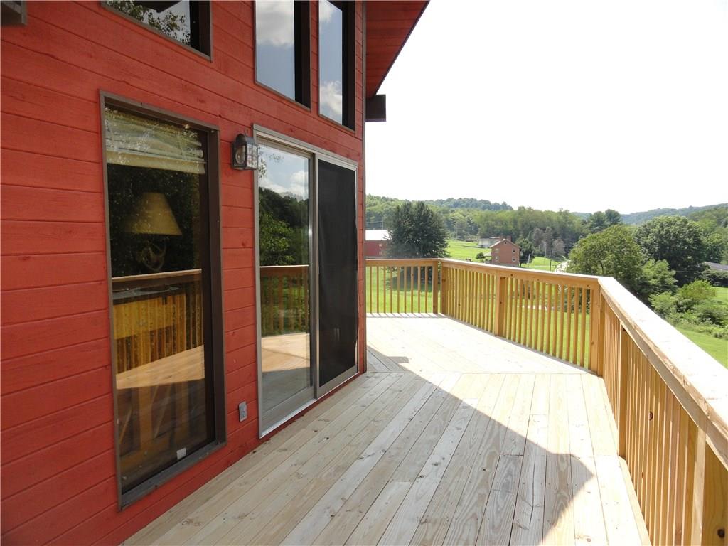 1127 Pine Run Road Apollo, PA 15613 - Photo 4 of 25 32' in front and 15' on side, 7.5' deep wrap around deck in 2017