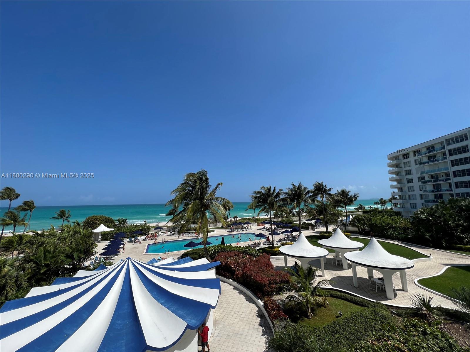 5161 Collins Avenue, Unit 514 Miami Beach, FL 33140 - Photo 4 of 34 a view of a patio with furniture and outdoor space