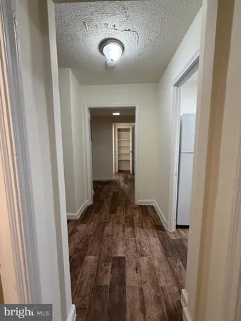 a view of a livingroom from a hallway