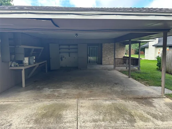 a view of backyard with cabin