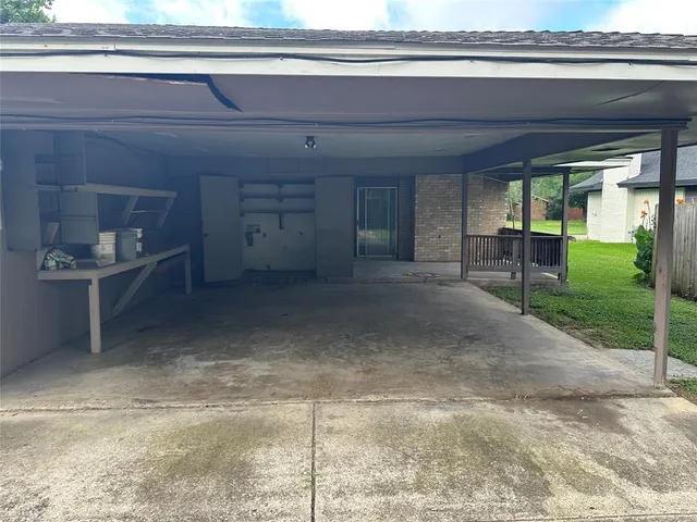 a view of backyard with cabin