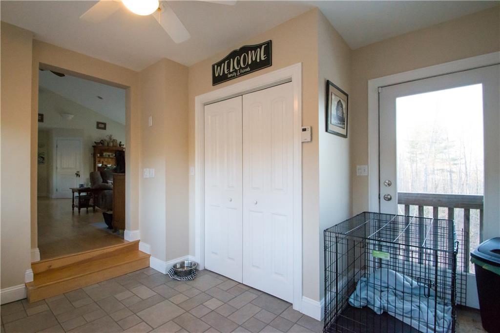 144 Garland Road Shapleigh, ME 04076 - Photo 5 of 33 Mudroom with tile floor and coat closet