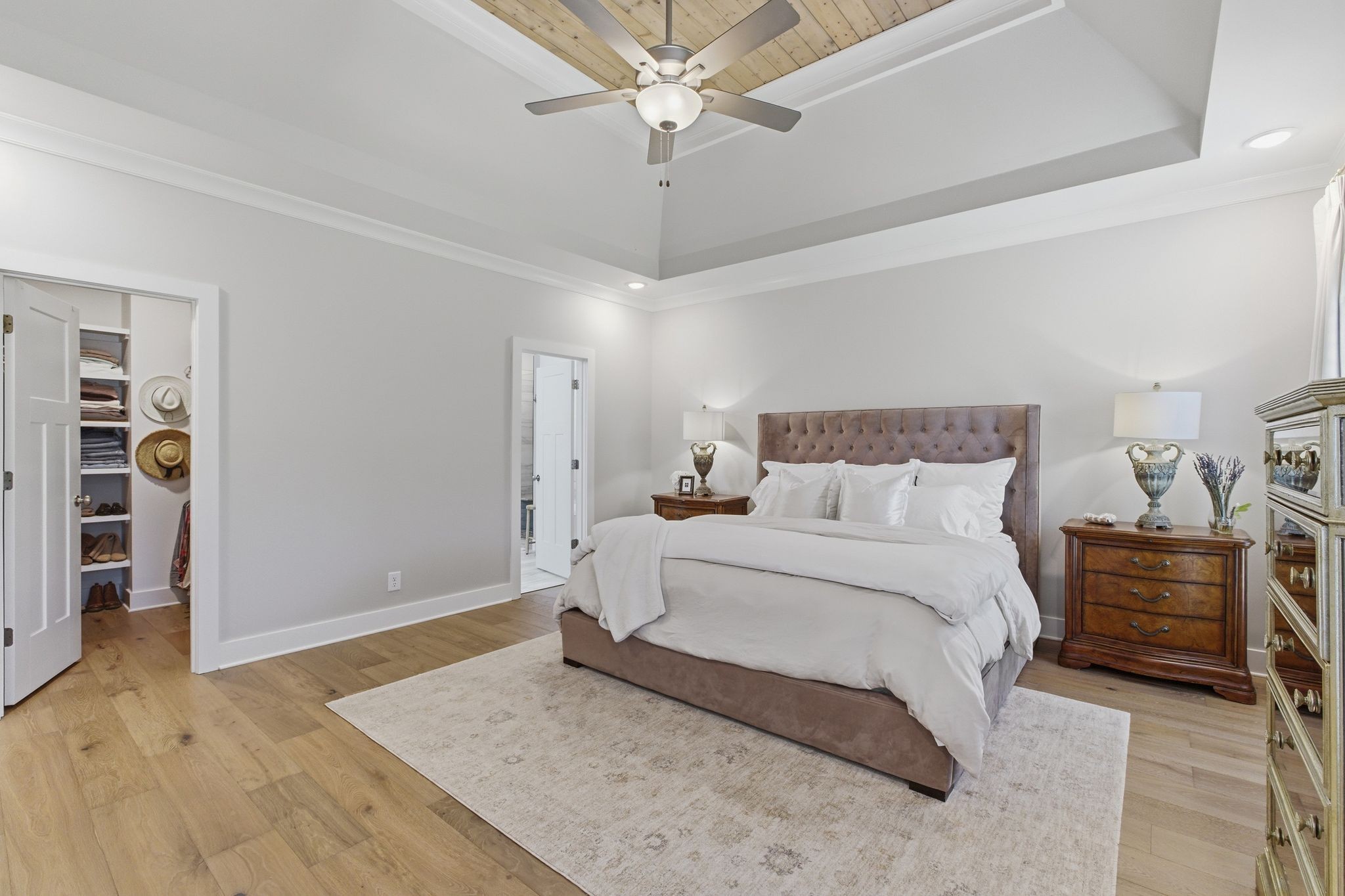 17845 Highway 76 East Springfield, TN 37172 - Photo 28 of 55 a bedroom with a bed and a chandelier