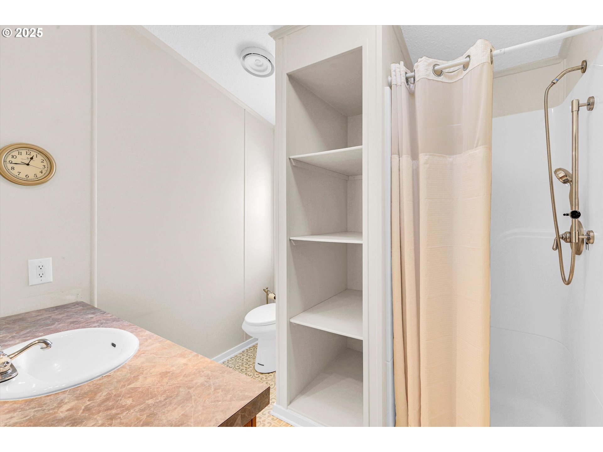 17655 Bluff Road, Unit 73 Sandy, OR 97055 - Photo 25 of 41 a bathroom with a granite countertop sink toilet and shower