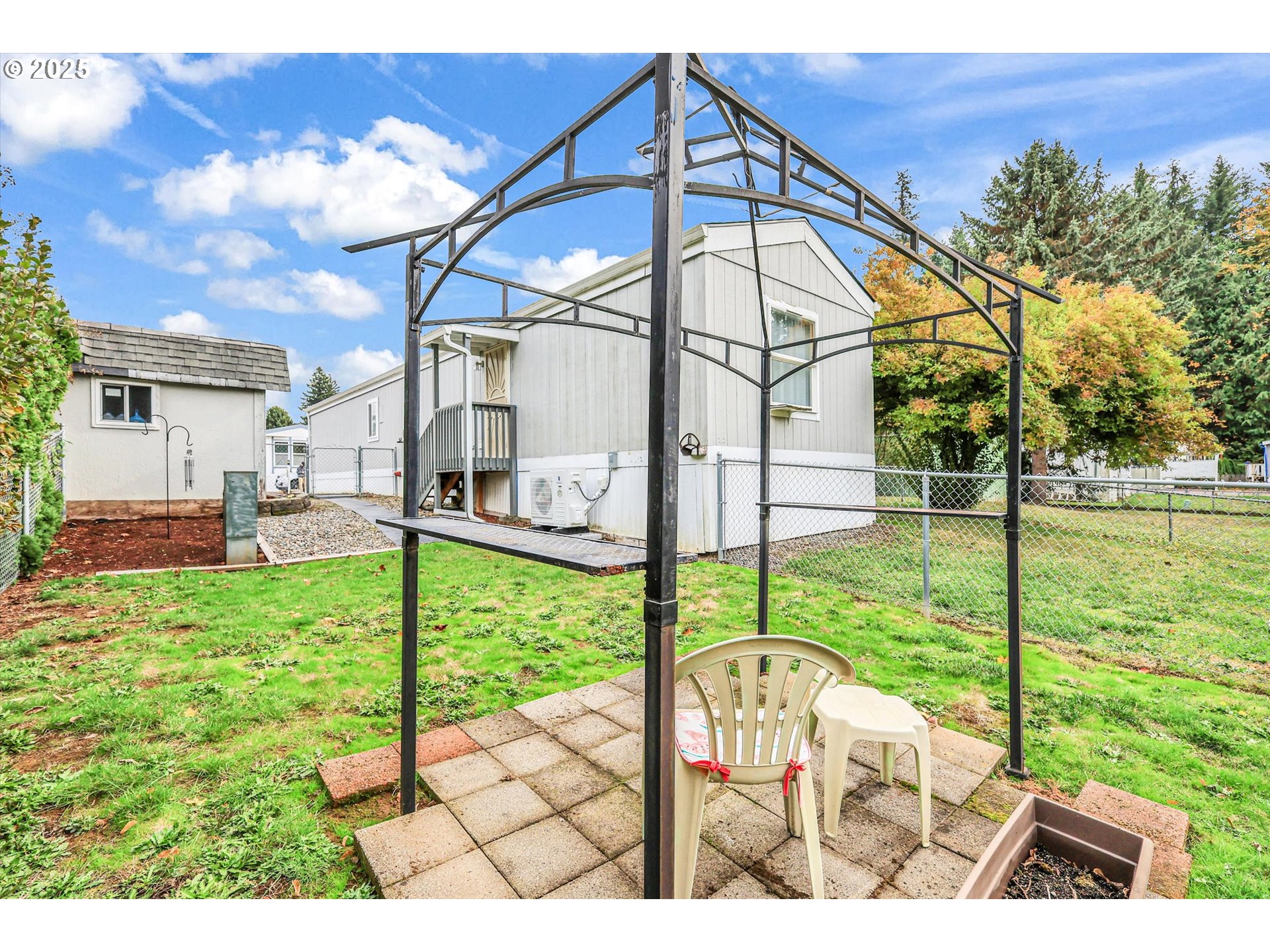 17655 Bluff Road, Unit 73 Sandy, OR 97055 - Photo 38 of 41 a view of a house with backyard and sitting area