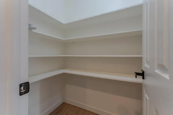 a view of an empty walk in closet