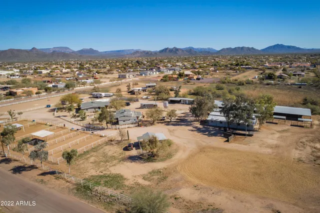 an aerial view of residential house with outdoor space