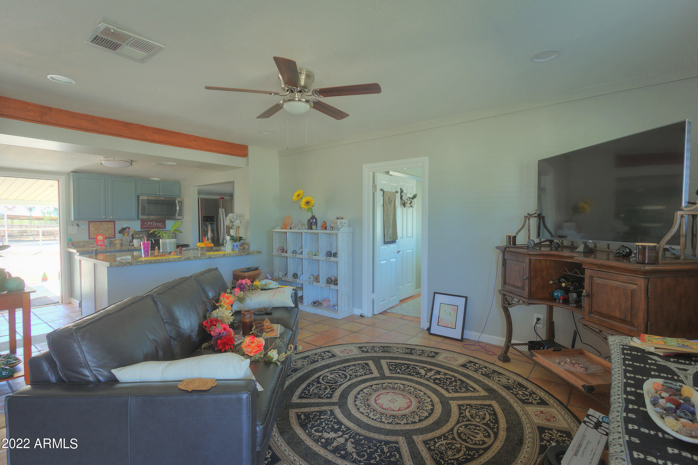 35225 North 3rd Street Phoenix, AZ 85086 - Photo 31 of 40 a living room with furniture and a flat screen tv