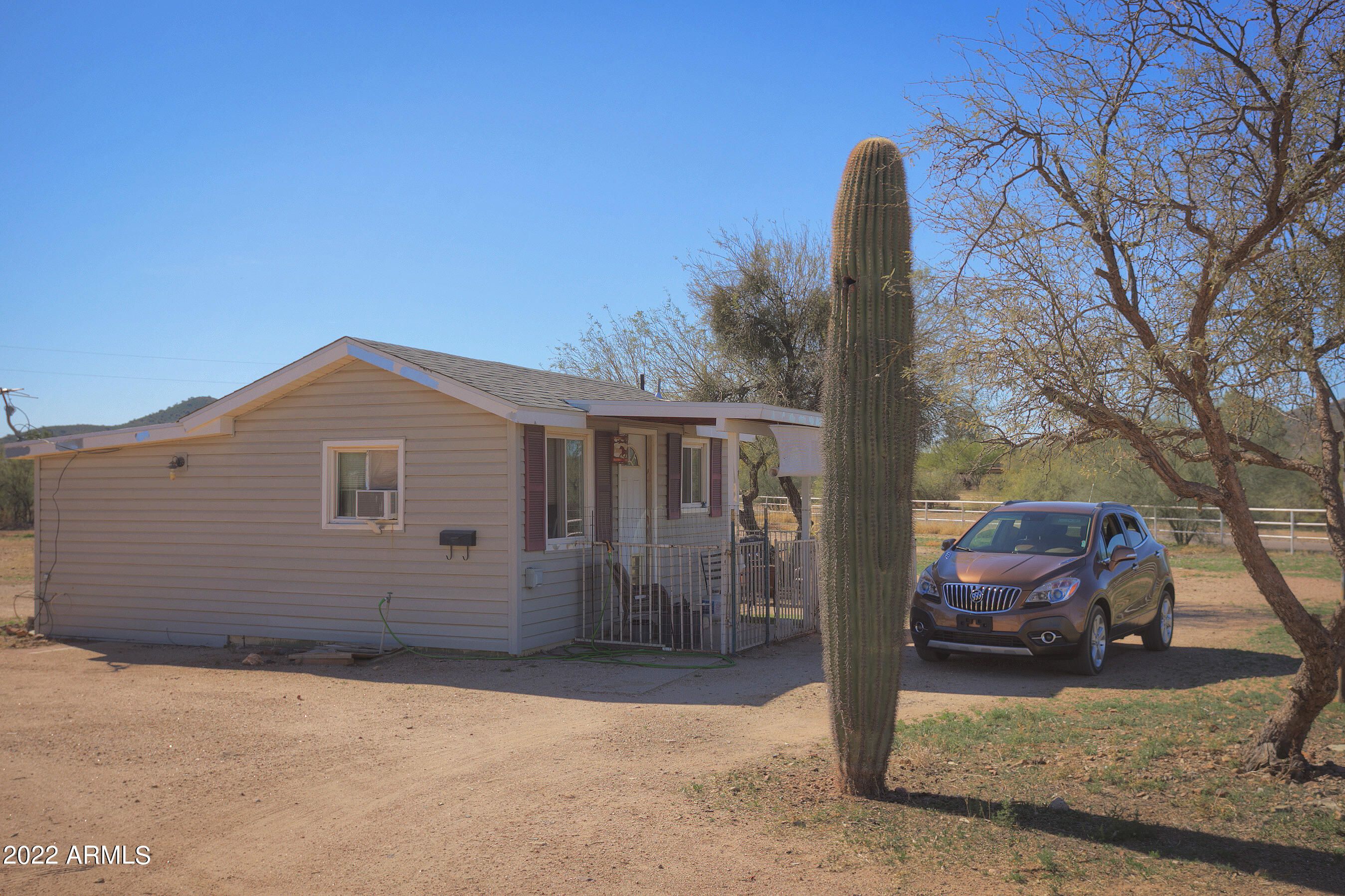 35225 North 3rd Street Phoenix, AZ 85086 - Photo 32 of 40 a view of a house with a yard