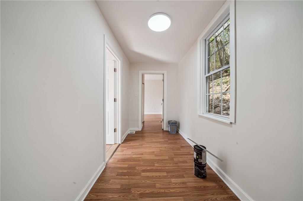 2819 Spring Garden Avenue Pittsburgh, PA 15212 - Photo 13 of 25 an entryway of a house and wooden floor