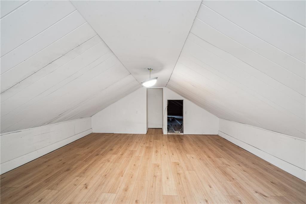 2819 Spring Garden Avenue Pittsburgh, PA 15212 - Photo 23 of 25 wooden floor in an empty room with a window