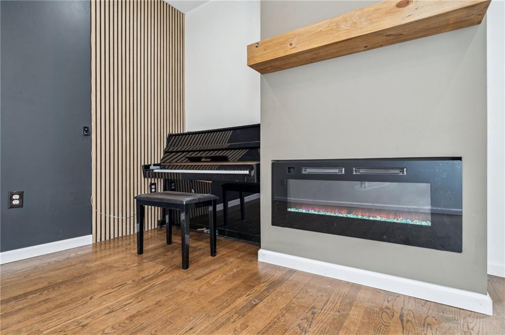 2819 Spring Garden Avenue Pittsburgh, PA 15212 - Photo 7 of 25 a view of an empty room with wooden floor