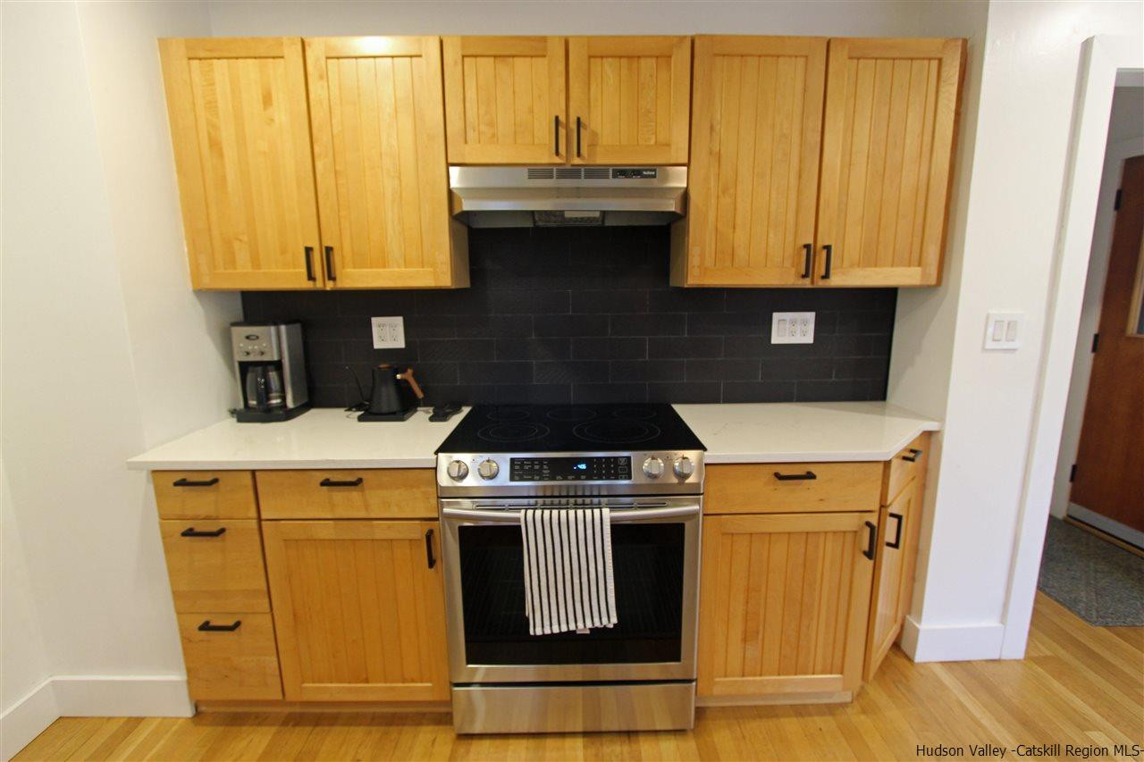 30-32 Rudy Frank Road Shandaken, NY 12480 - Photo 14 of 35 a stove top oven sitting inside of a kitchen