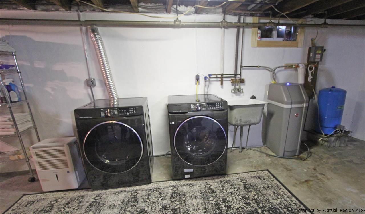 30-32 Rudy Frank Road Shandaken, NY 12480 - Photo 30 of 35 a utility room with sink dryer and washer