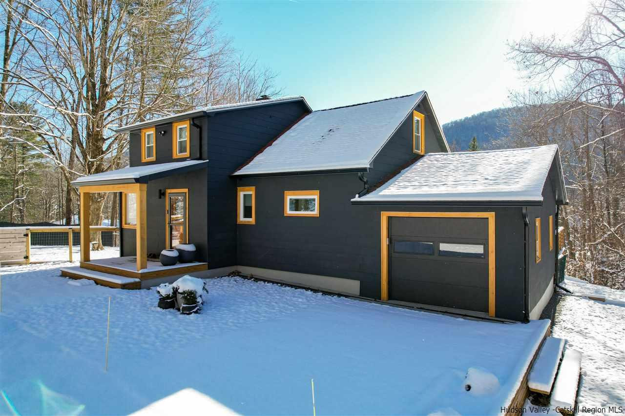 30-32 Rudy Frank Road Shandaken, NY 12480 - Photo 5 of 35 a backyard of a house with seating space
