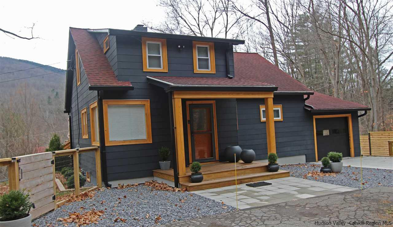30-32 Rudy Frank Road Shandaken, NY 12480 - Photo 6 of 35 a front view of a house with a yard